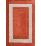 Terracotta orange and beige bordered hand-tufted wool rug